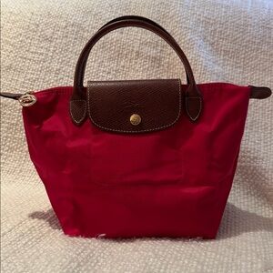 NWOT Small Longchamp Le Pliage top handle tote in Red